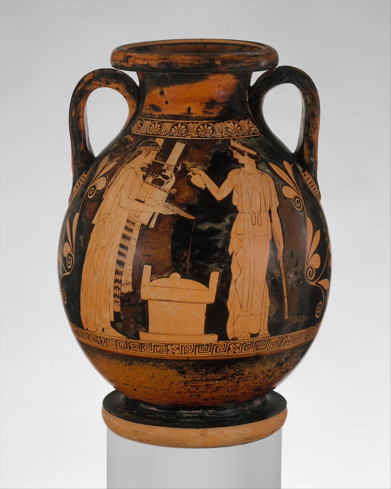Red-figure jar: Apollo holding a kithara faces Artemis
